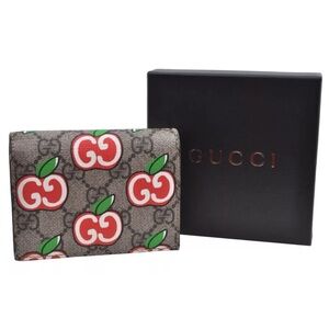 S⃘O⃘L⃘D⃘ Authentic: Gucci GG Supreme Apple bi—fold Wallet